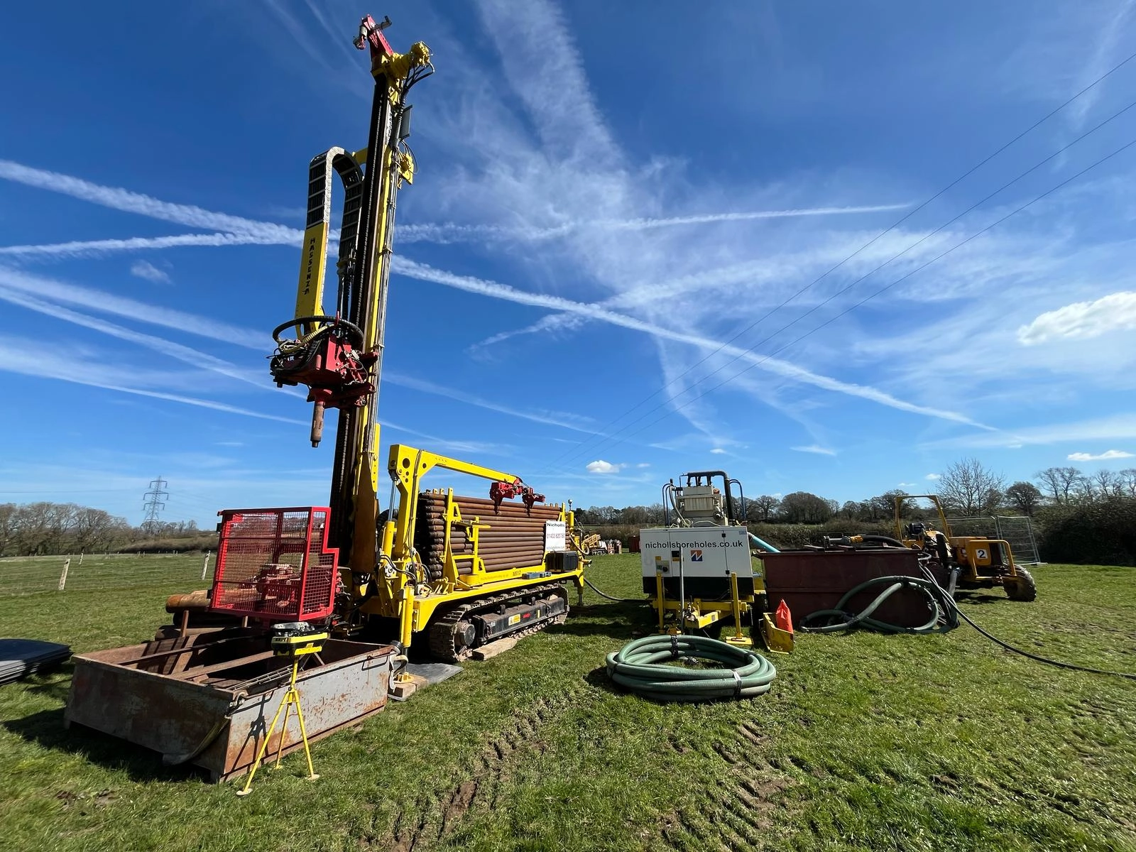 Water borehole drilling rig and equipment at a groundwater well project in West Sussex